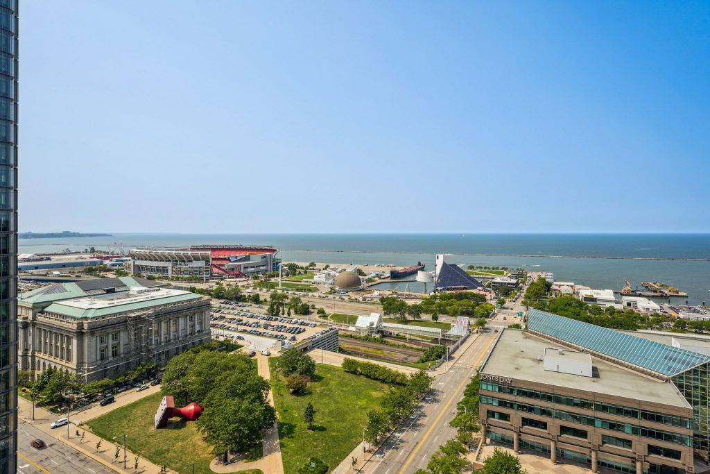 A view of Lake Erie, the Cleveland Browns Stadium, and other Downtown Cleveland landmarks, taken from above The Bell Aparrtments.